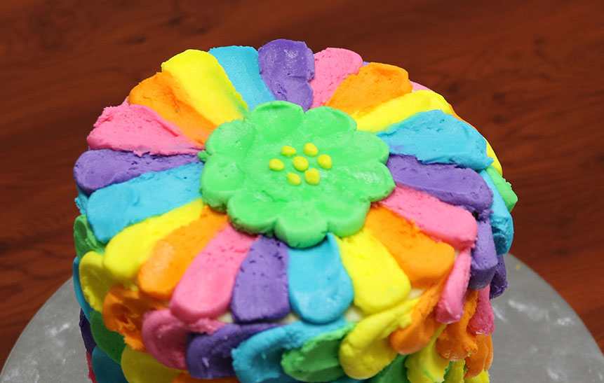 Top of rainbow iced cake