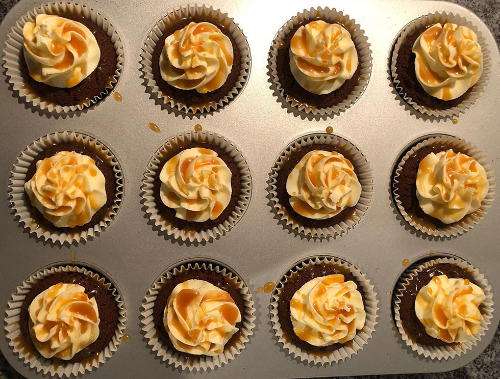 Tray of iced cupcakes